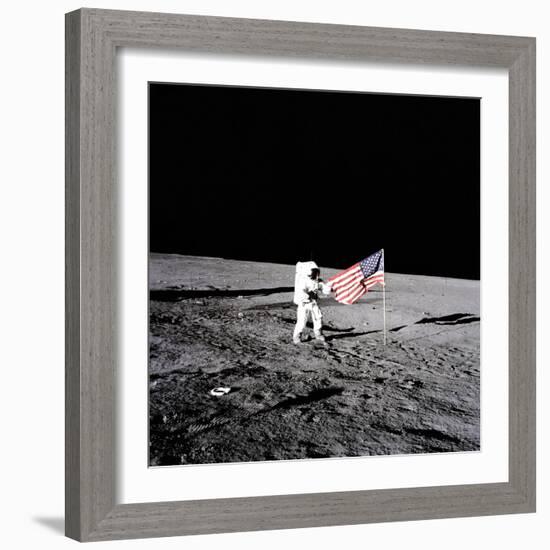 Apollo 12 Astronaut Charles "Pete" Conrad Stands Beside the United States Flag-null-Framed Photo