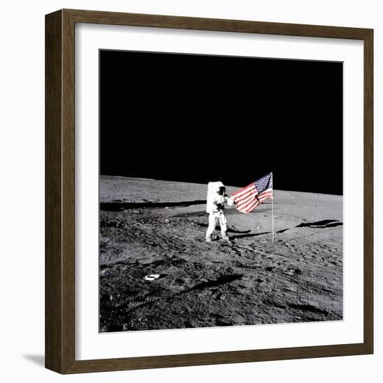 Apollo 12 Astronaut Charles "Pete" Conrad Stands Beside the United States Flag-null-Framed Photo