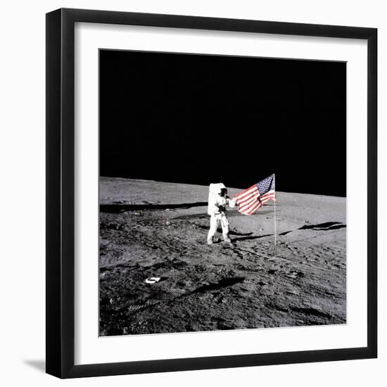 Apollo 12 Astronaut Charles "Pete" Conrad Stands Beside the United States Flag-null-Framed Photo