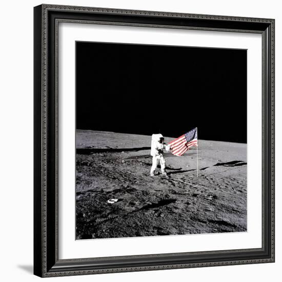 Apollo 12 Astronaut Charles "Pete" Conrad Stands Beside the United States Flag-null-Framed Photo