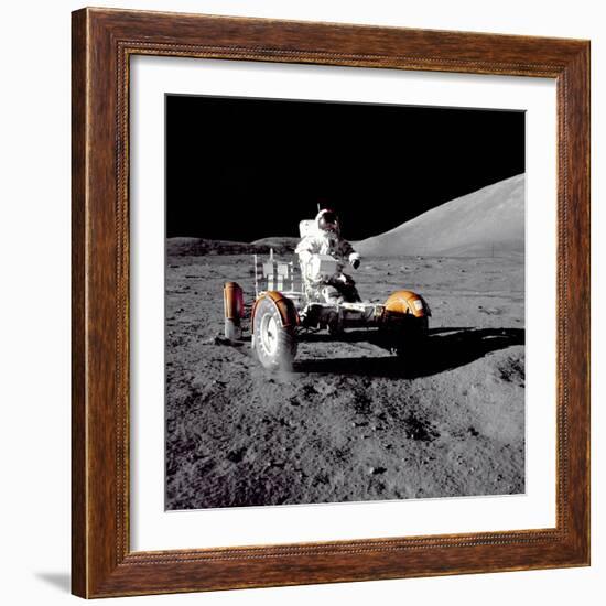 Apollo 17 Astronaut Eugene a Cernan Driving the Lunar Rover-null-Framed Photo