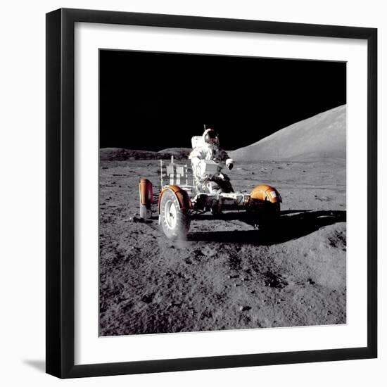 Apollo 17 Astronaut Eugene a Cernan Driving the Lunar Rover-null-Framed Photo