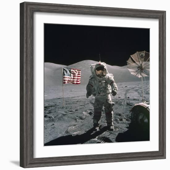 Apollo 17 Astronaut Stands Between US Flag and Lunar Rover, Dec 12, 1971-null-Framed Photo