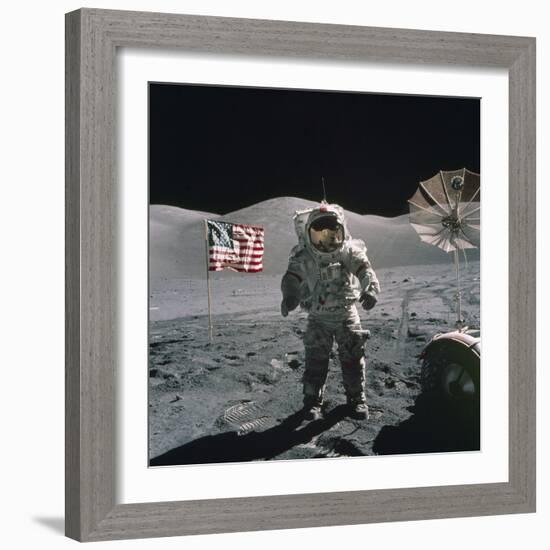 Apollo 17 Astronaut Stands Between US Flag and Lunar Rover, Dec 12, 1971-null-Framed Photo