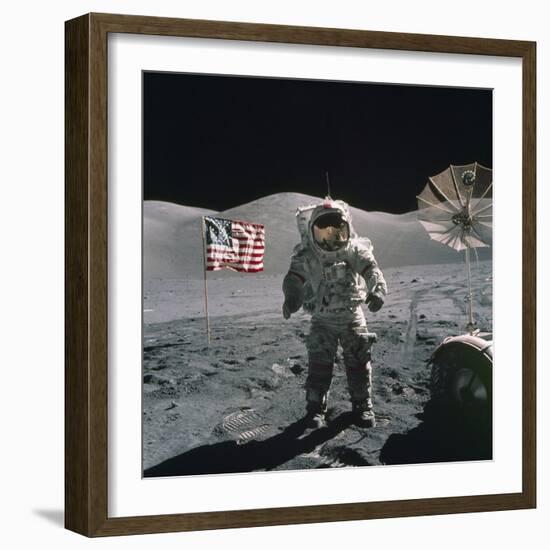 Apollo 17 Astronaut Stands Between US Flag and Lunar Rover, Dec 12, 1971-null-Framed Photo