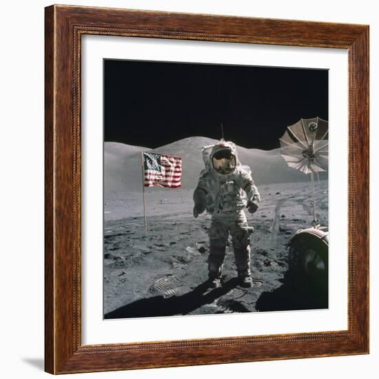 Apollo 17 Astronaut Stands Between US Flag and Lunar Rover, Dec 12, 1971-null-Framed Photo