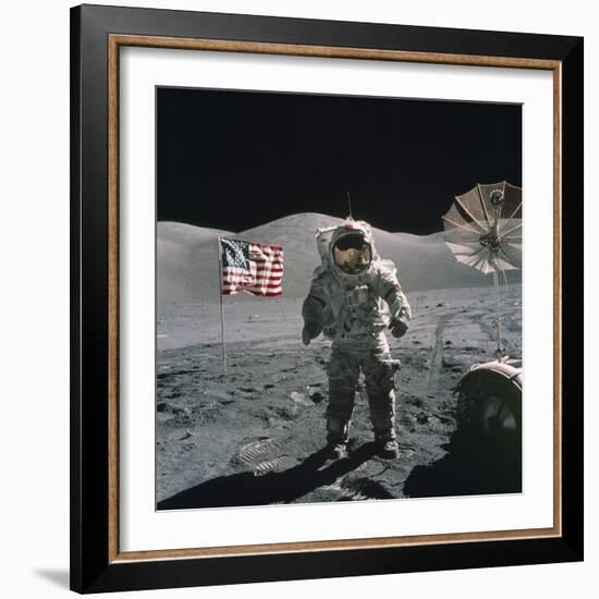 Apollo 17 Astronaut Stands Between US Flag and Lunar Rover, Dec 12, 1971-null-Framed Photo