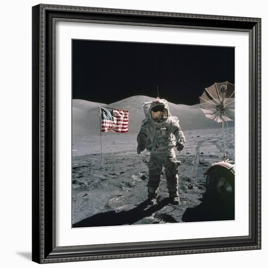 Apollo 17 Astronaut Stands Between US Flag and Lunar Rover, Dec 12, 1971-null-Framed Photo