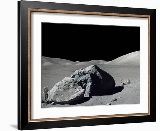 Apollo 17 Geologist-Astronaut Harrison Schmitt Standing Next to a Huge, Split Lunar Boulder-null-Framed Photo