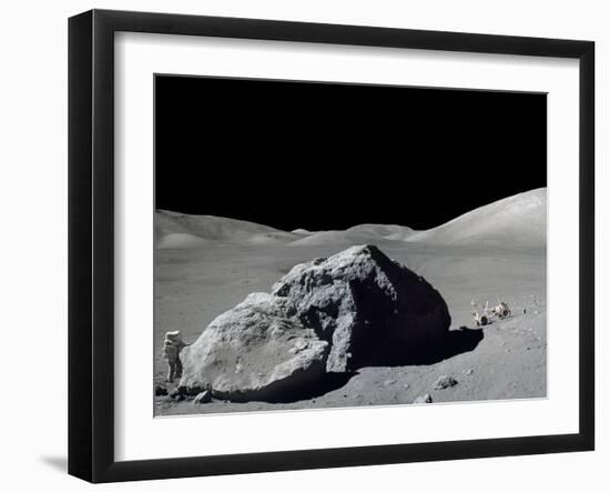 Apollo 17 Geologist-Astronaut Harrison Schmitt Standing Next to a Huge, Split Lunar Boulder-null-Framed Photo