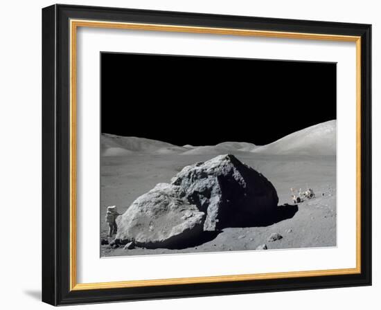 Apollo 17 Geologist-Astronaut Harrison Schmitt Standing Next to a Huge, Split Lunar Boulder-null-Framed Photo