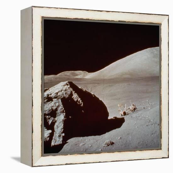 Apollo 17's Rover, a Lunar Vehicle, on the Surface of the Moon Next to Giant Rock-null-Framed Premier Image Canvas