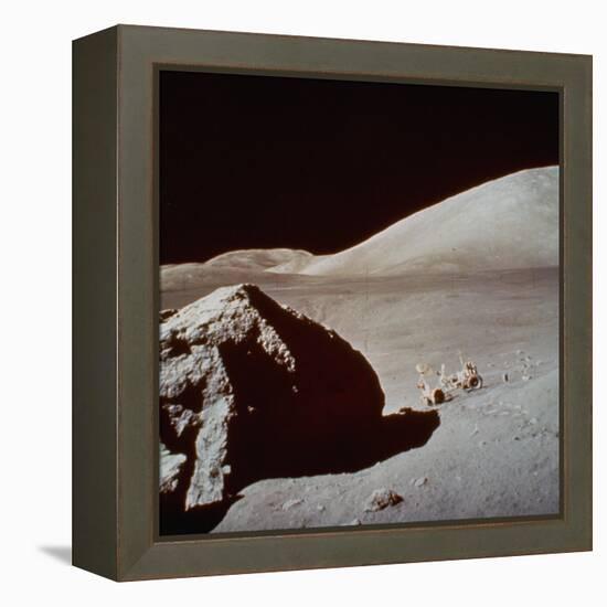 Apollo 17's Rover, a Lunar Vehicle, on the Surface of the Moon Next to Giant Rock-null-Framed Premier Image Canvas