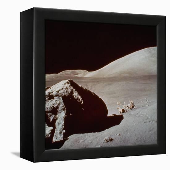 Apollo 17's Rover, a Lunar Vehicle, on the Surface of the Moon Next to Giant Rock-null-Framed Premier Image Canvas