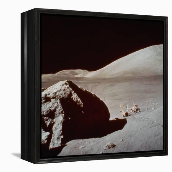 Apollo 17's Rover, a Lunar Vehicle, on the Surface of the Moon Next to Giant Rock-null-Framed Premier Image Canvas