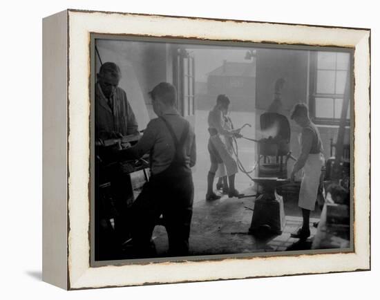 Apprentice Blacksmiths-null-Framed Premier Image Canvas