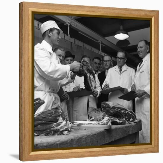 Apprentice Butcher Showing His Work to Competition Judges, Barnsley, South Yorkshire, 1963-Michael Walters-Framed Premier Image Canvas