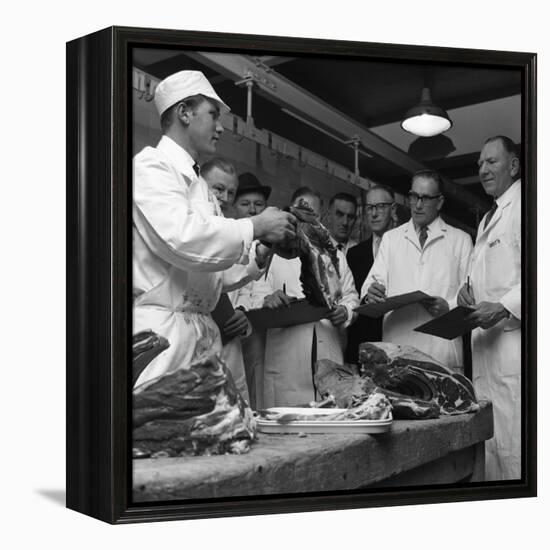Apprentice Butcher Showing His Work to Competition Judges, Barnsley, South Yorkshire, 1963-Michael Walters-Framed Premier Image Canvas