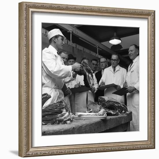 Apprentice Butcher Showing His Work to Competition Judges, Barnsley, South Yorkshire, 1963-Michael Walters-Framed Photographic Print