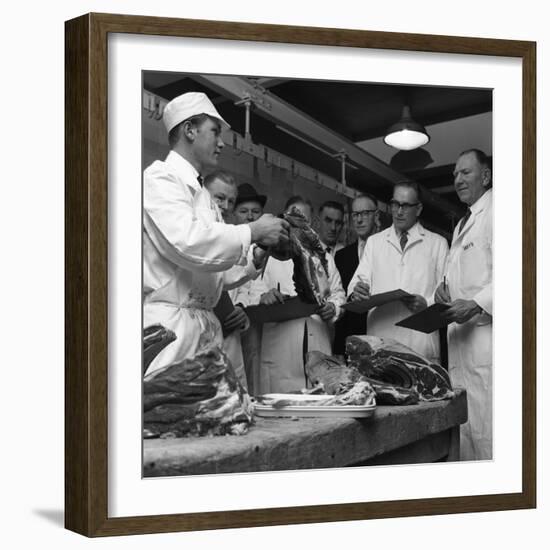 Apprentice Butcher Showing His Work to Competition Judges, Barnsley, South Yorkshire, 1963-Michael Walters-Framed Photographic Print