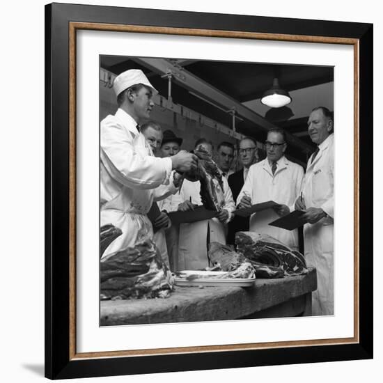 Apprentice Butcher Showing His Work to Competition Judges, Barnsley, South Yorkshire, 1963-Michael Walters-Framed Photographic Print