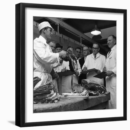 Apprentice Butcher Showing His Work to Competition Judges, Barnsley, South Yorkshire, 1963-Michael Walters-Framed Photographic Print