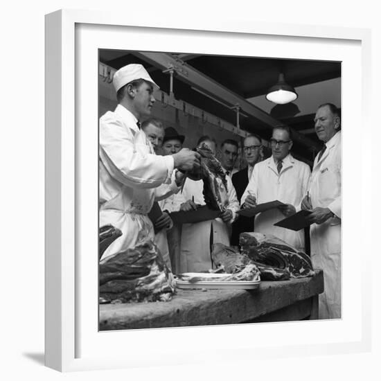 Apprentice Butcher Showing His Work to Competition Judges, Barnsley, South Yorkshire, 1963-Michael Walters-Framed Photographic Print