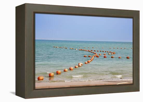 Arabian Peninsula, Persian Gulf, State of Qatar, Doha. Orange buoys in bay.-Emily Wilson-Framed Premier Image Canvas