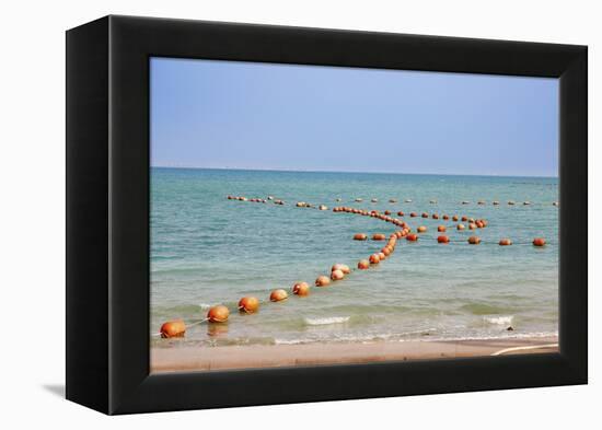 Arabian Peninsula, Persian Gulf, State of Qatar, Doha. Orange buoys in bay.-Emily Wilson-Framed Premier Image Canvas