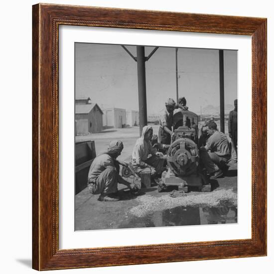 Arabians Working in the Oil Co.'s Garage-Bob Landry-Framed Photographic Print