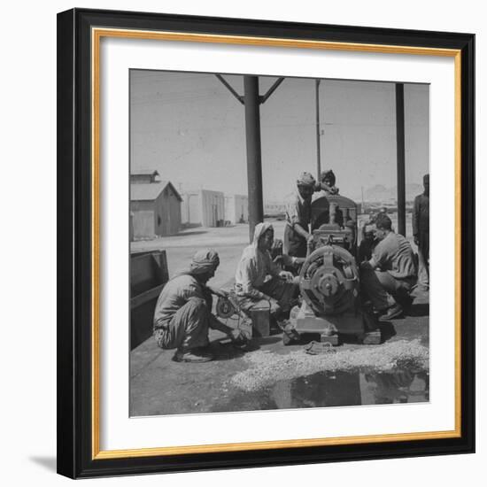 Arabians Working in the Oil Co.'s Garage-Bob Landry-Framed Photographic Print