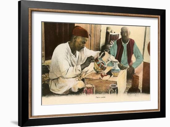 Arabic Potter-null-Framed Art Print