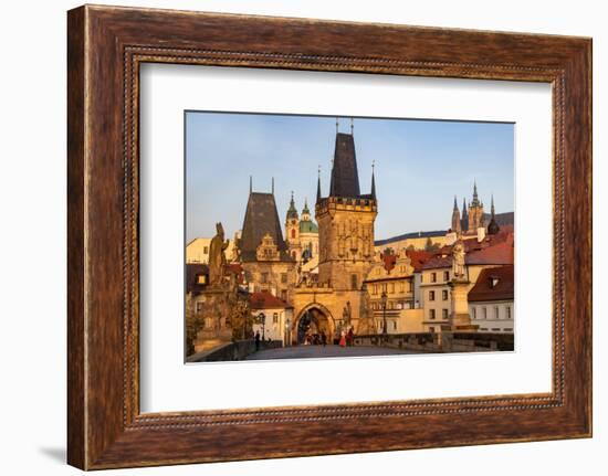 Arch of Lesser Town Bridge Tower on Charles Bridge with St. Nicholas Church in Prague.-Chuck Haney-Framed Photographic Print