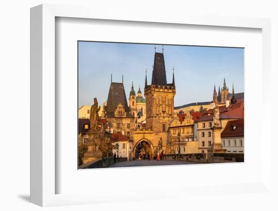 Arch of Lesser Town Bridge Tower on Charles Bridge with St. Nicholas Church in Prague.-Chuck Haney-Framed Photographic Print