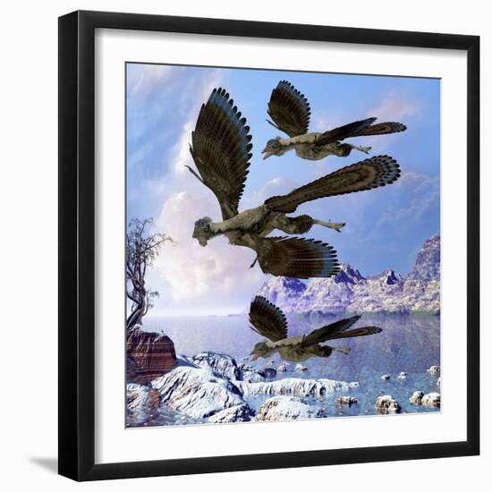 Archaeopteryx Birds Fly Near a Shoreline on a Cloudy Prehistoric Day-Stocktrek Images-Framed Art Print