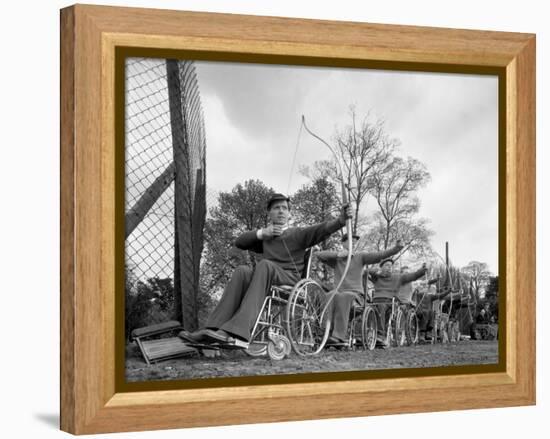 Archery Practice at the Ciswo Paraplegic Centre, Pontefract, West Yorkshire, 1960-Michael Walters-Framed Premier Image Canvas