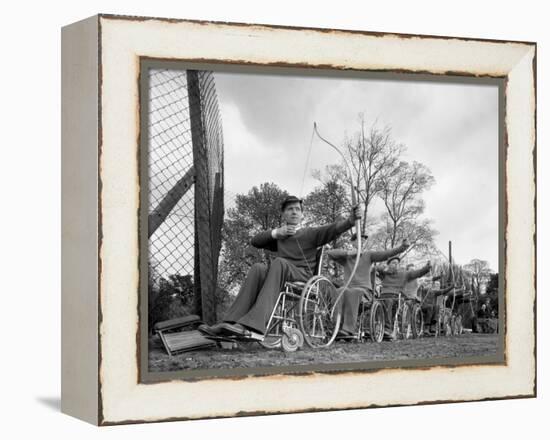 Archery Practice at the Ciswo Paraplegic Centre, Pontefract, West Yorkshire, 1960-Michael Walters-Framed Premier Image Canvas