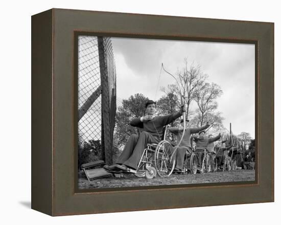 Archery Practice at the Ciswo Paraplegic Centre, Pontefract, West Yorkshire, 1960-Michael Walters-Framed Premier Image Canvas