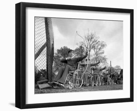 Archery Practice at the Ciswo Paraplegic Centre, Pontefract, West Yorkshire, 1960-Michael Walters-Framed Photographic Print