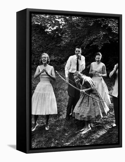 Archery Providing Entertainment at a Teenage Party-Yale Joel-Framed Premier Image Canvas