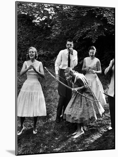 Archery Providing Entertainment at a Teenage Party-Yale Joel-Mounted Photographic Print