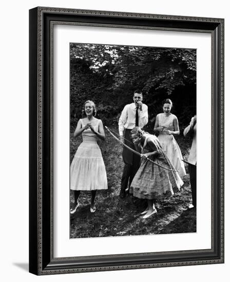 Archery Providing Entertainment at a Teenage Party-Yale Joel-Framed Photographic Print