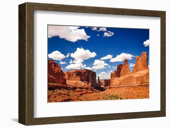 Arches National Park Landscape View with Blue Sky and White Clou-MartinM303-Framed Photographic Print