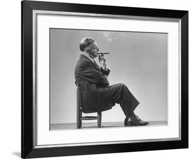 Architect Frederick Kiesler Seated in a Child's Chair ...