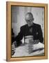 Architect Le Corbusier Studying Architectural Plans and Small Model of Building in His Office-Nina Leen-Framed Premier Image Canvas