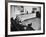 Architect Mies Van Der Rohe Relaxing on Couch While Smoking Cigar and Reading at Home-null-Framed Premium Photographic Print