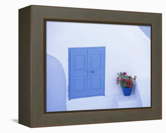 Architectural Detail of Blue and White House, with Pot of Geraniums, Oia (Ia), Aegean Sea, Greece-Sergio Pitamitz-Framed Premier Image Canvas