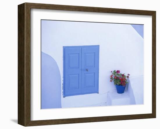 Architectural Detail of Blue and White House, with Pot of Geraniums, Oia (Ia), Aegean Sea, Greece-Sergio Pitamitz-Framed Photographic Print