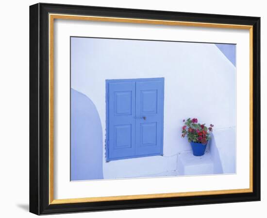 Architectural Detail of Blue and White House, with Pot of Geraniums, Oia (Ia), Aegean Sea, Greece-Sergio Pitamitz-Framed Photographic Print