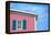 Architecture Detail of a Pink House with Blue Shuttered Window against Blue Sky-pink candy-Framed Premier Image Canvas